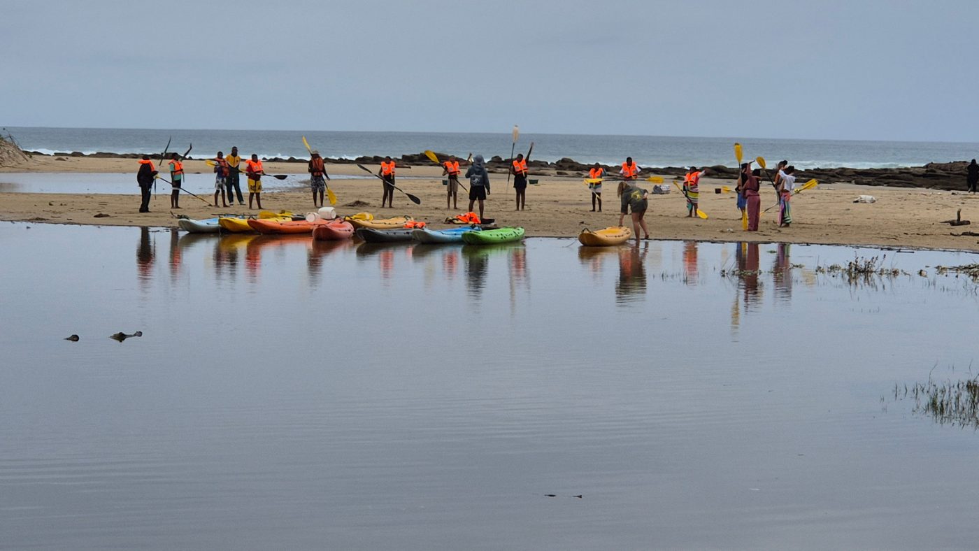 School group with canoes on the Nahoon River