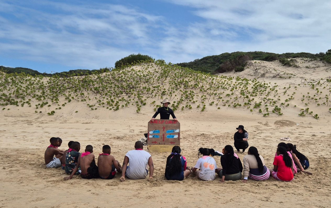 Rip current safety lesson on the dunes